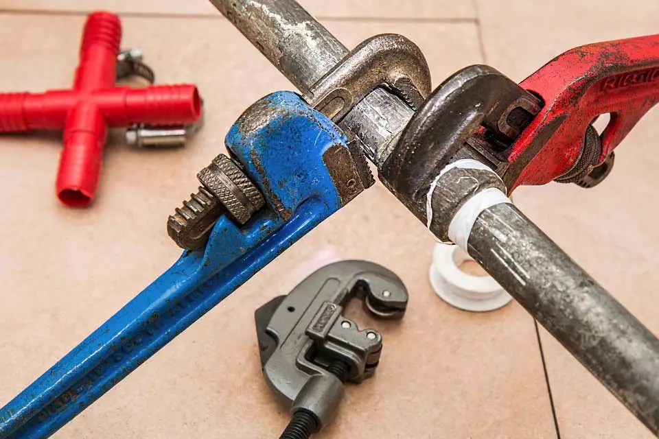 Pipe wrench and plumbing repair materials